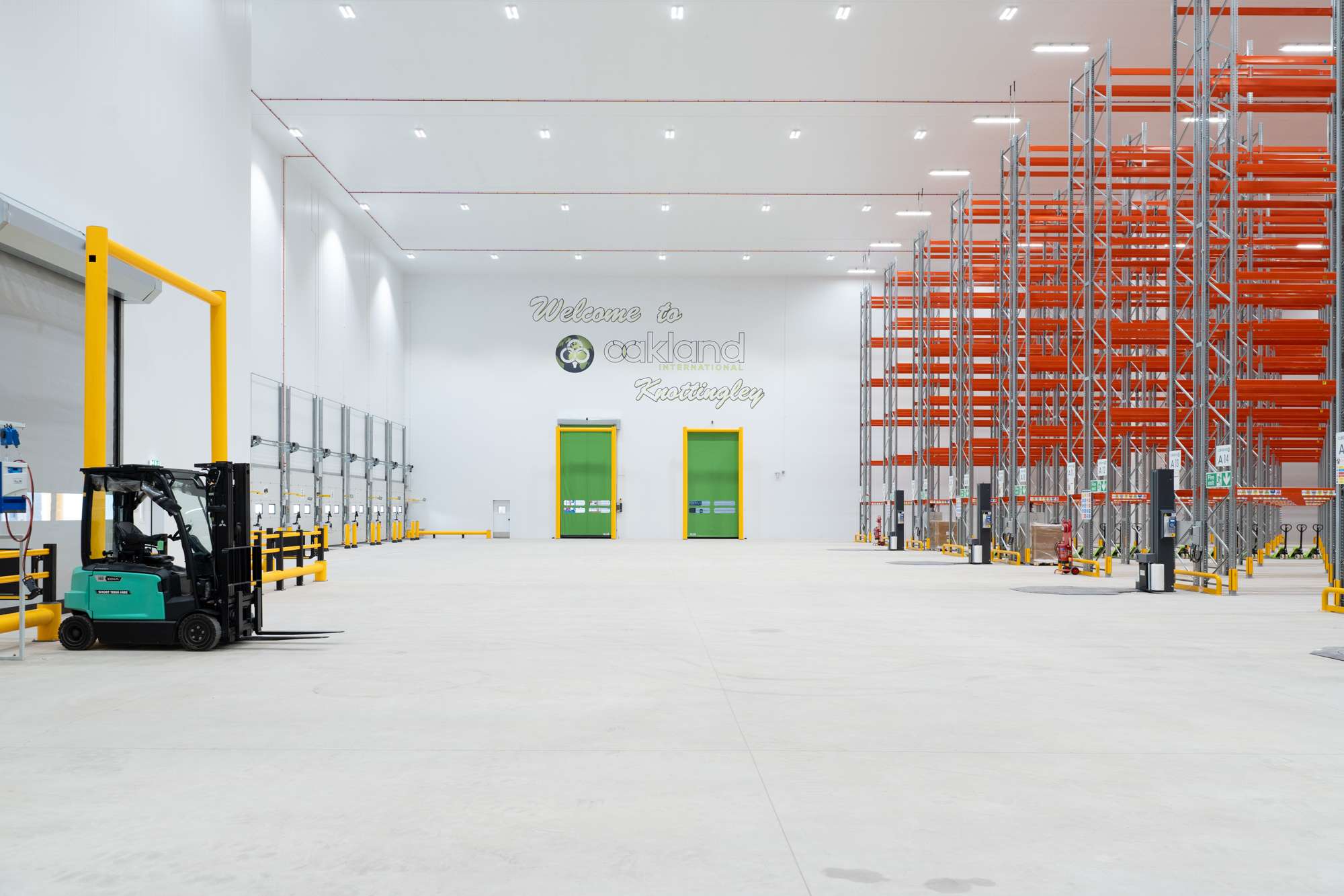 Warehouse with forklift and rapid-roll door access